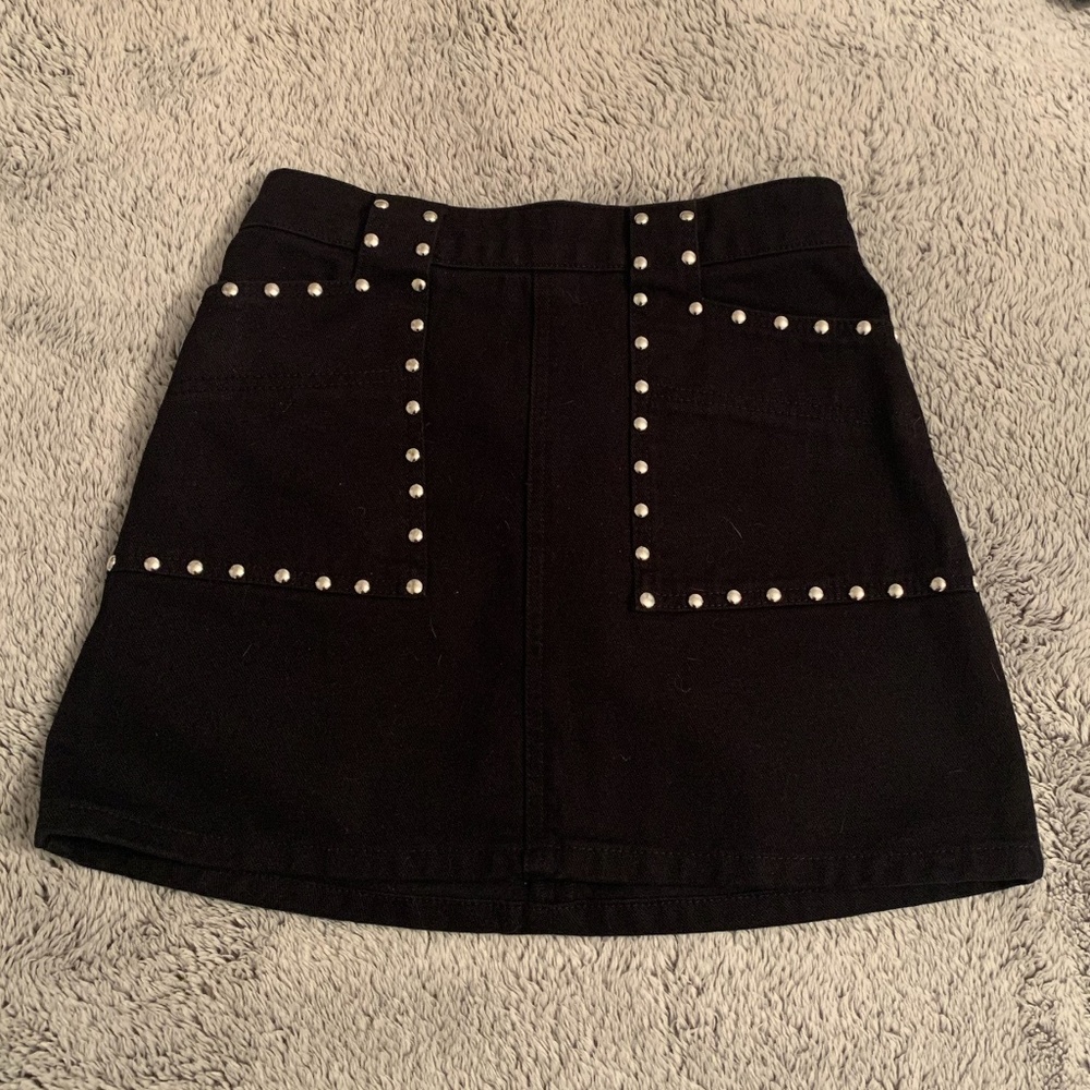 Studded black mini skirt